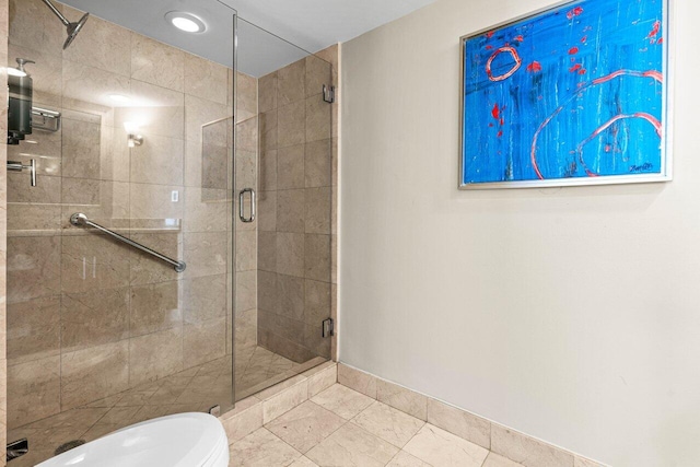 full bathroom featuring a shower stall