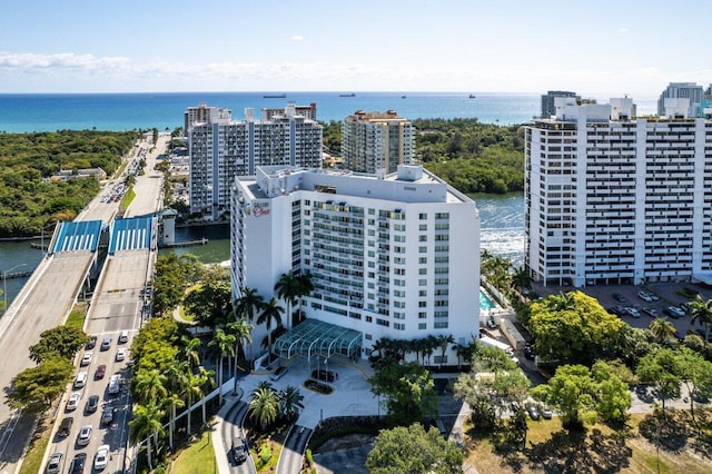 drone / aerial view with a water view and a city view