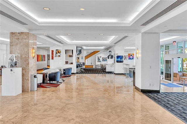 reception area with stairway and visible vents