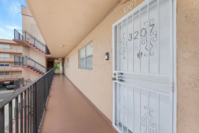 doorway to property with a balcony