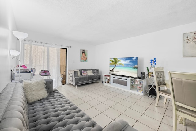 tiled living room with a textured ceiling