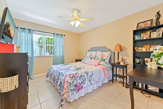 bedroom featuring ceiling fan and light tile patterned floors