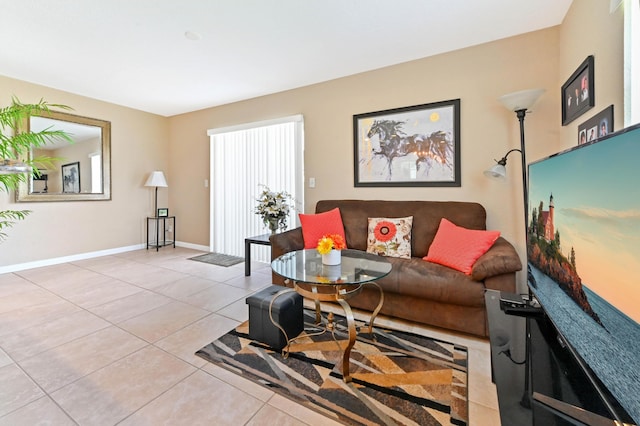 262 Monaco F, Delray Beach, FL 33446 - living room featuring tile patterned flooring and baseboards