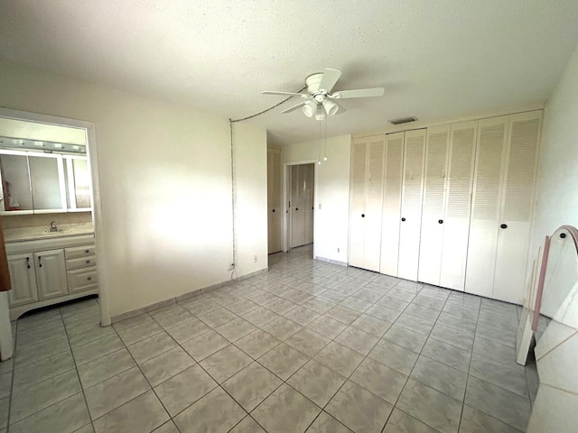 kitchen featuring white appliances, sink, white cabinets, and tasteful backsplash