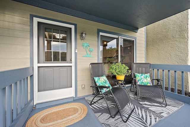 doorway to property with a porch