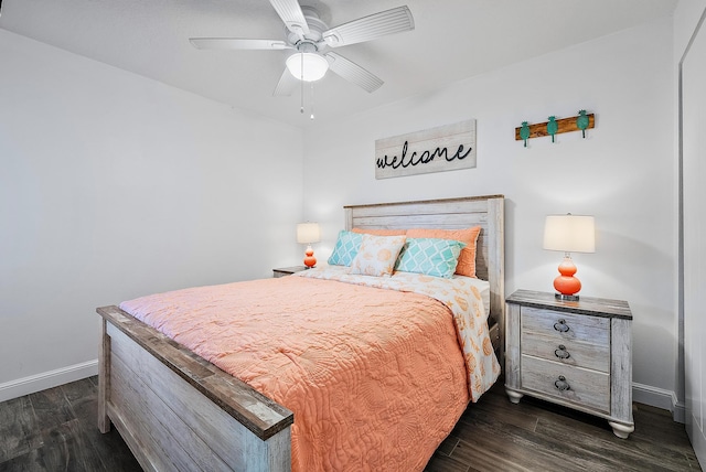 bedroom with dark wood-type flooring and ceiling fan