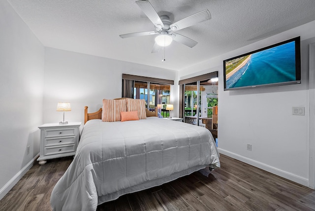 bedroom with dark wood-type flooring, ceiling fan, access to outside, and a textured ceiling