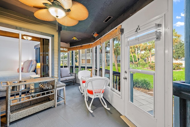 sunroom / solarium featuring plenty of natural light