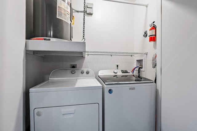 laundry room featuring independent washer and dryer