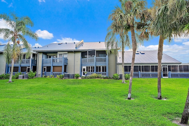 view of building exterior with central air condition unit