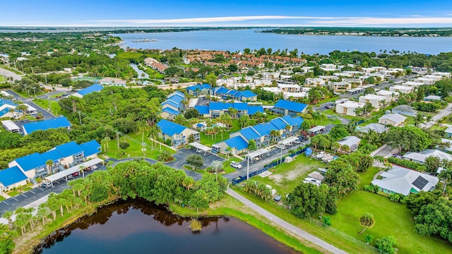 bird's eye view with a water view