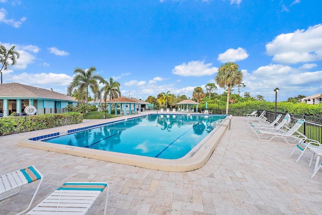 view of swimming pool featuring a patio area