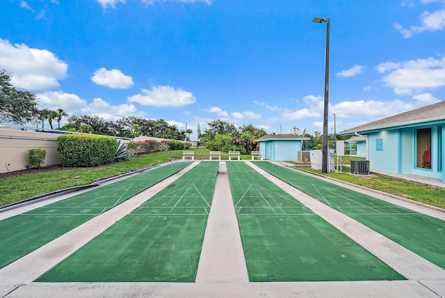 view of community featuring a yard