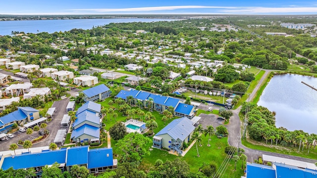 bird's eye view with a water view