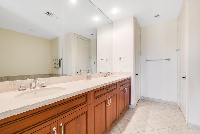 bathroom featuring vanity and tile patterned flooring