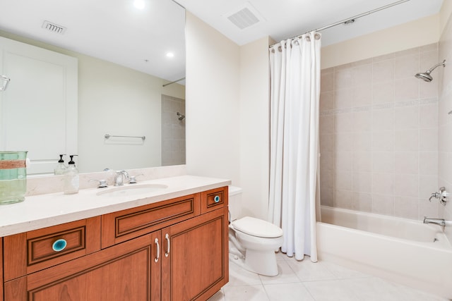 full bathroom with tile patterned floors, toilet, shower / tub combo, and vanity