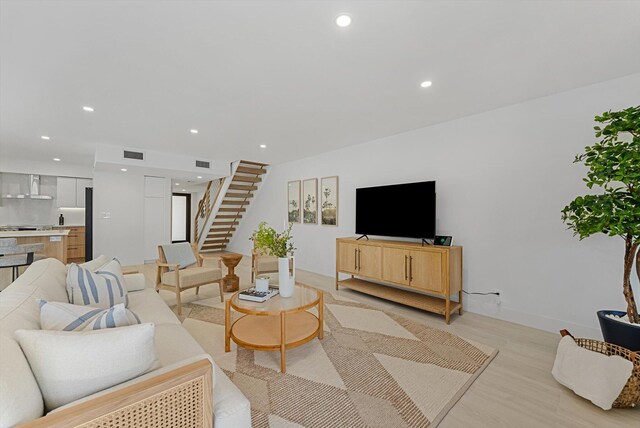 living room featuring light wood-type flooring