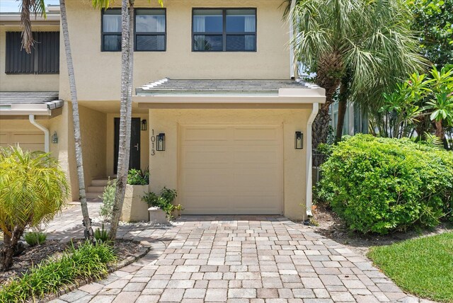 view of front of property featuring a garage