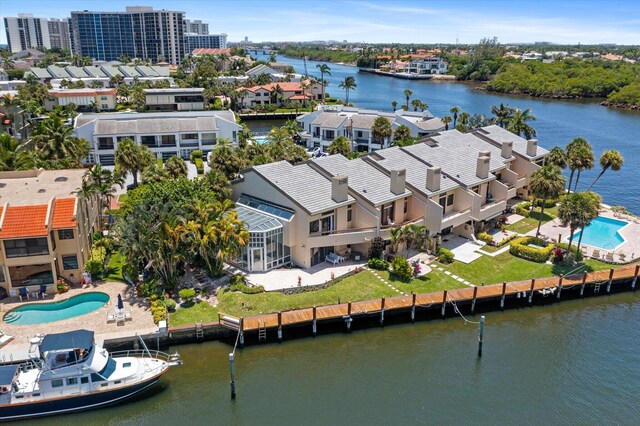 birds eye view of property featuring a water view