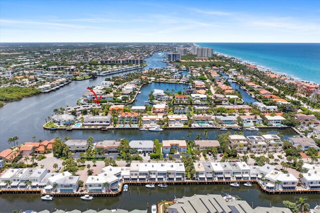 birds eye view of property featuring a water view