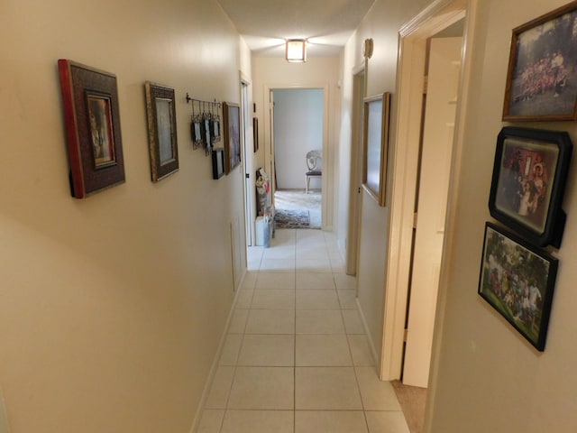 hallway with light tile patterned flooring