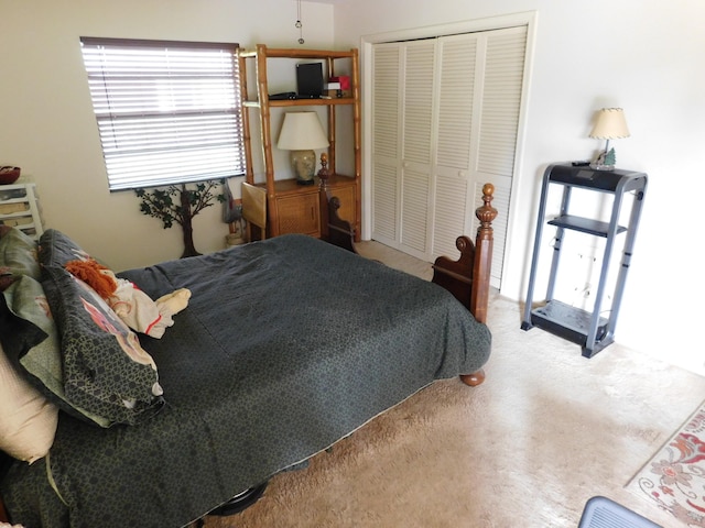 carpeted bedroom with a closet