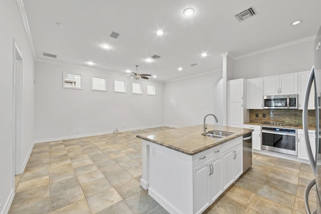 12520 NW 79th Mnr, Parkland, FL 33076 - kitchen with ceiling fan, visible vents, a sink, stone countertops, and stainless steel appliances