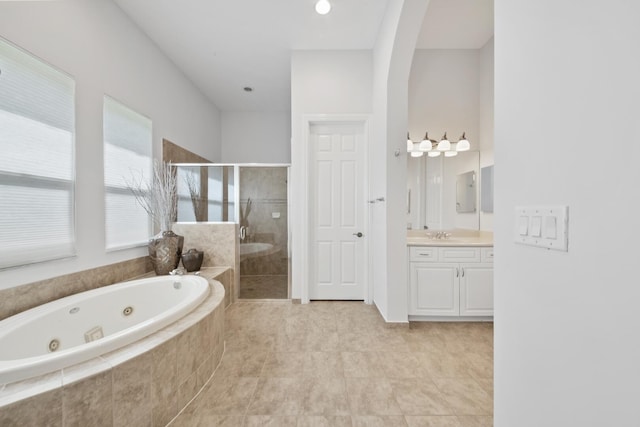 12520 NW 79th Mnr, Parkland, FL 33076 - bathroom with a jetted tub, tile patterned floors, vanity, and a shower stall