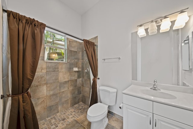 12520 NW 79th Mnr, Parkland, FL 33076 - full bathroom with vanity, baseboards, a tile shower, and toilet