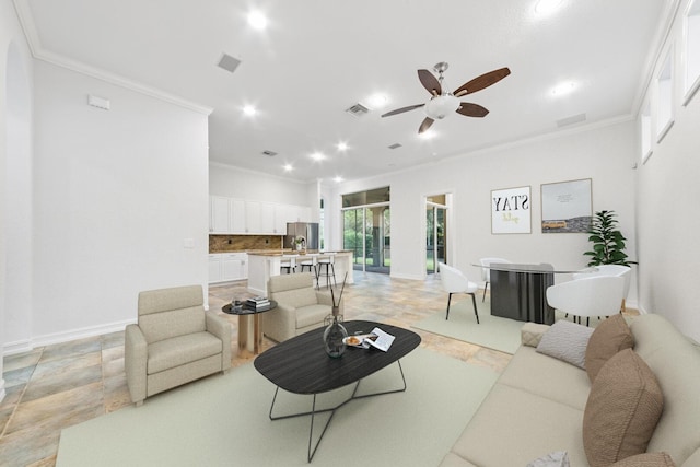 12520 NW 79th Mnr, Parkland, FL 33076 - living area featuring ornamental molding, a ceiling fan, and stone tile floors