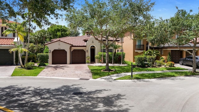 12520 NW 79th Mnr, Parkland, FL 33076 - mediterranean / spanish house with decorative driveway, a garage, a tile roof, and stucco siding