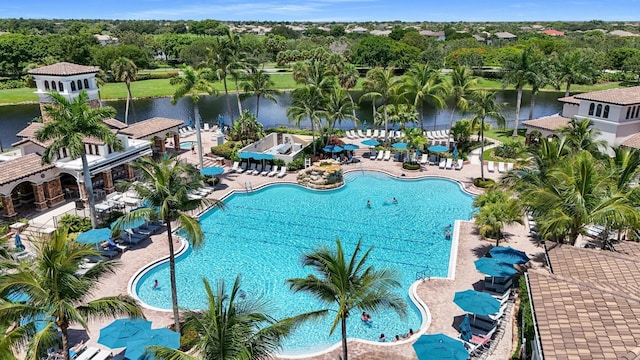 12520 NW 79th Mnr, Parkland, FL 33076 - pool featuring a patio and a water view