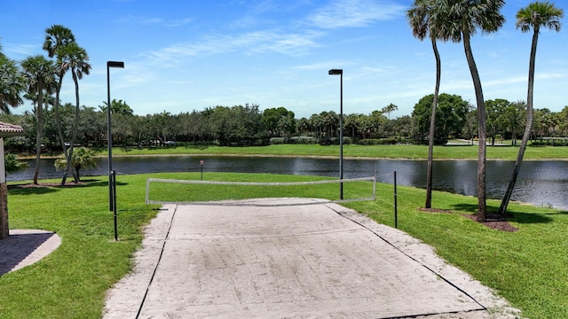 12520 NW 79th Mnr, Parkland, FL 33076 - surrounding community featuring a yard, a water view, and volleyball court