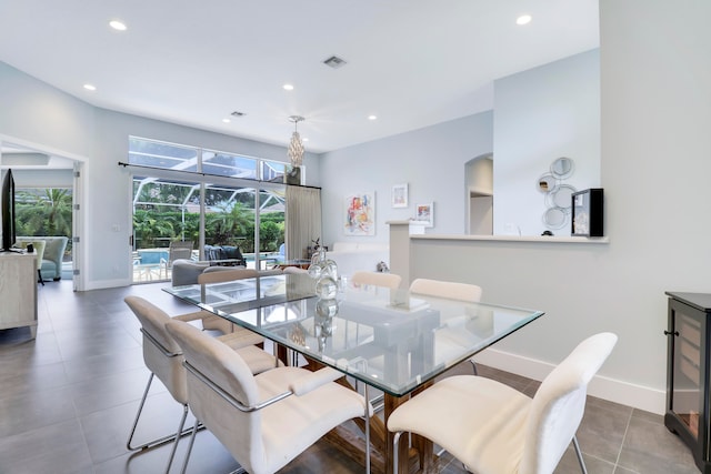 dining area with tile patterned flooring