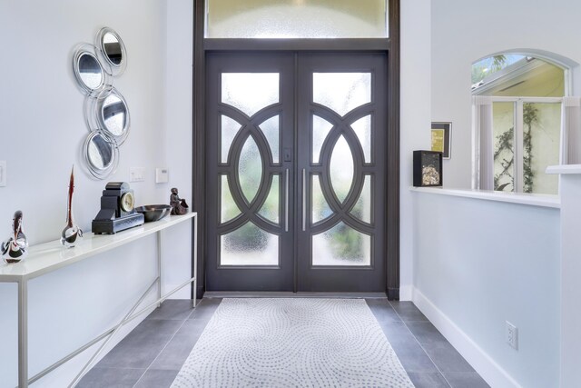 interior space with tile patterned floors