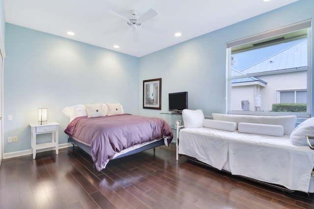 bedroom with dark wood-type flooring and ceiling fan