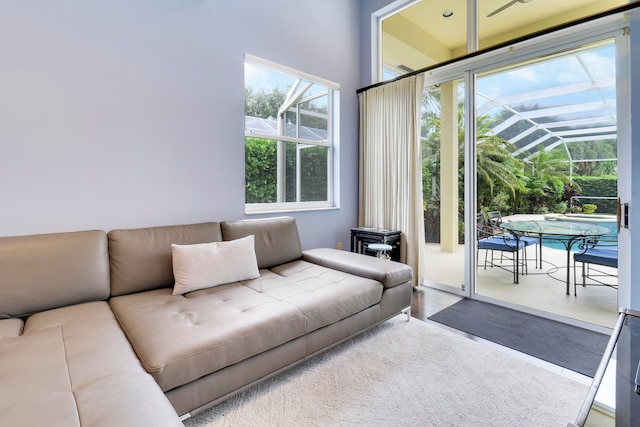 living room featuring vaulted ceiling and hardwood / wood-style flooring