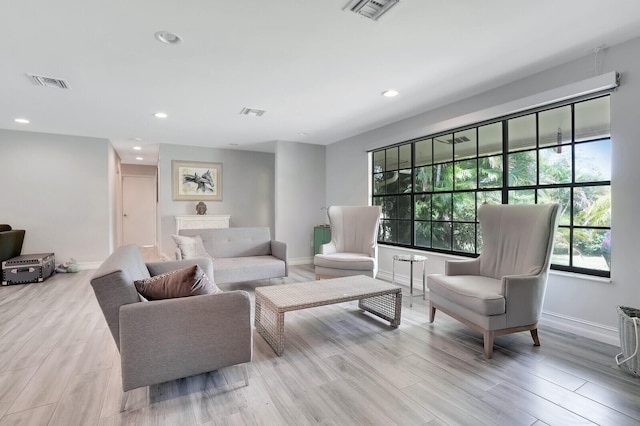 living room with light hardwood / wood-style floors