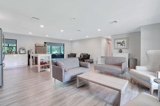 living room featuring light wood-type flooring