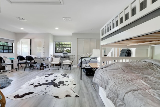 bedroom featuring light wood-type flooring