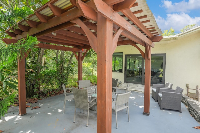 view of patio featuring a pergola