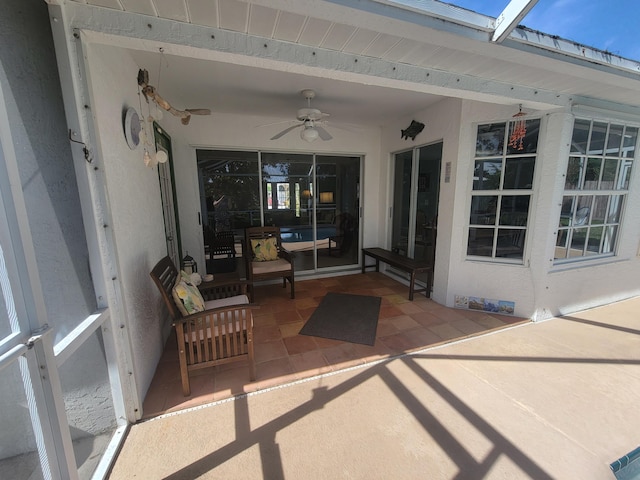 view of patio with ceiling fan