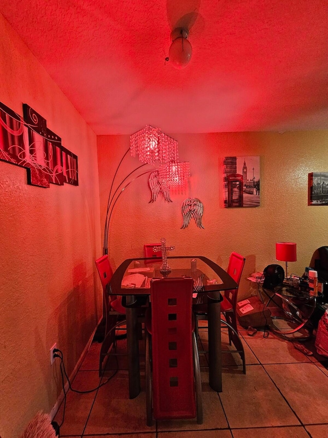 dining area featuring tile patterned flooring