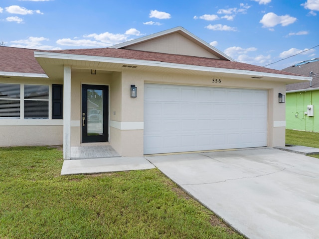 single story home featuring a front yard and a garage