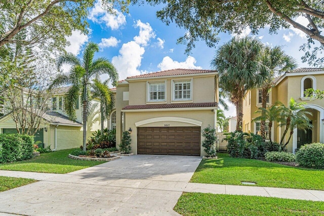 mediterranean / spanish-style house with a garage and a front lawn