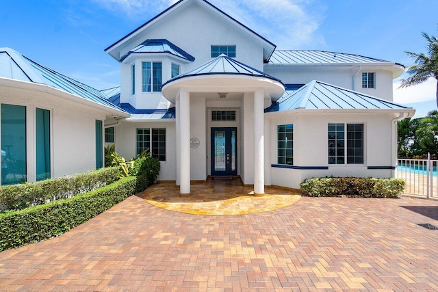 view of front facade with a patio area