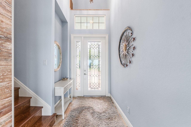 entryway with carpet floors