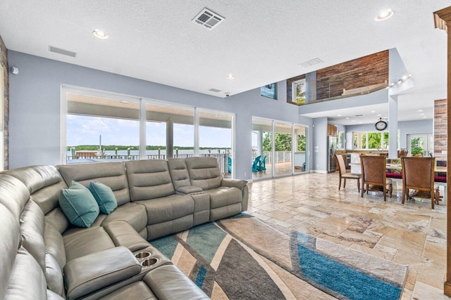 living room with a textured ceiling