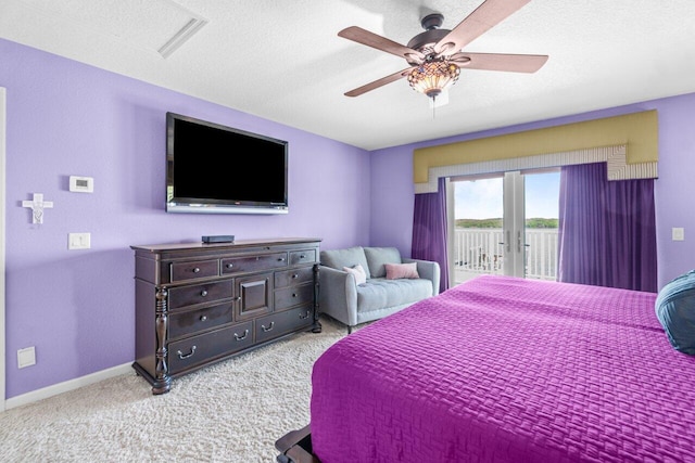 bedroom with access to exterior, french doors, ceiling fan, and light colored carpet