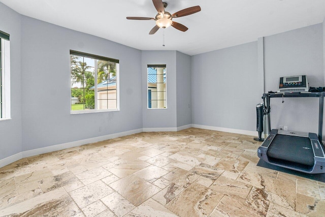 workout area with ceiling fan